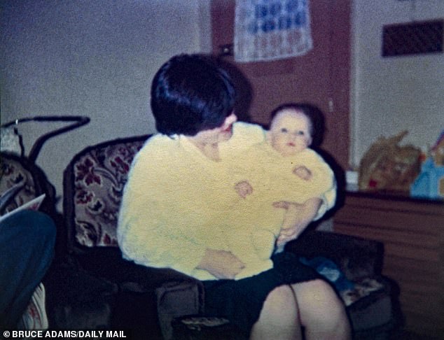 Newborn Kelly Higgins is pictured with her mother Bernadette McNeilly in 1985. The abusive mother would go on to murder Kelly's babysitter