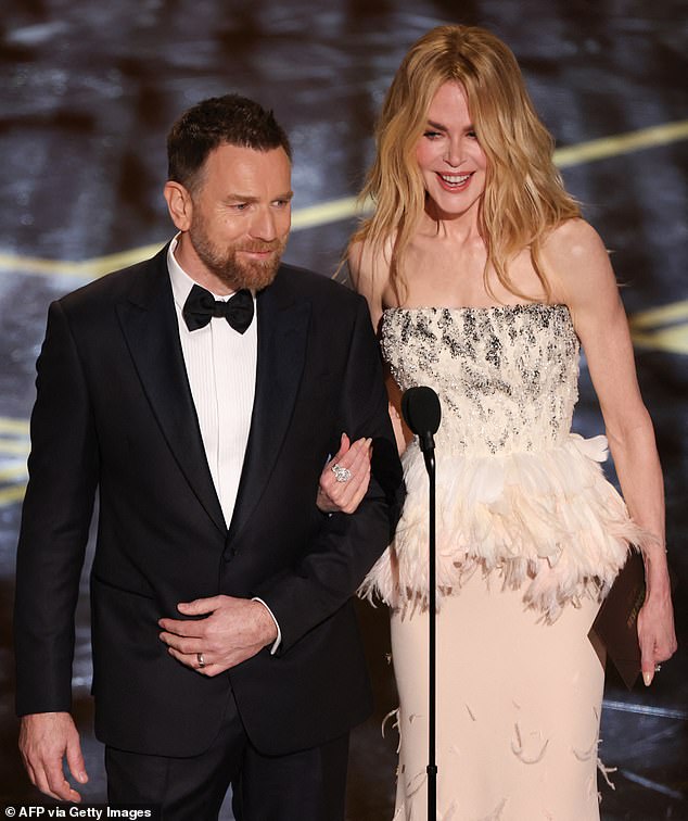 On Sunday, fans of the film were left delighted when stars Nicole and Ewan reunited at the Academy Awards to mark the anniversary (pictured)