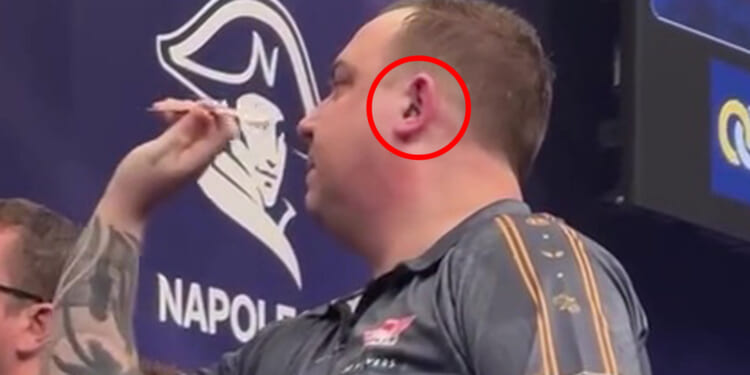 Darts star resorts to wearing earplugs on stage in desperate bid to silence 'amazing' home crowd