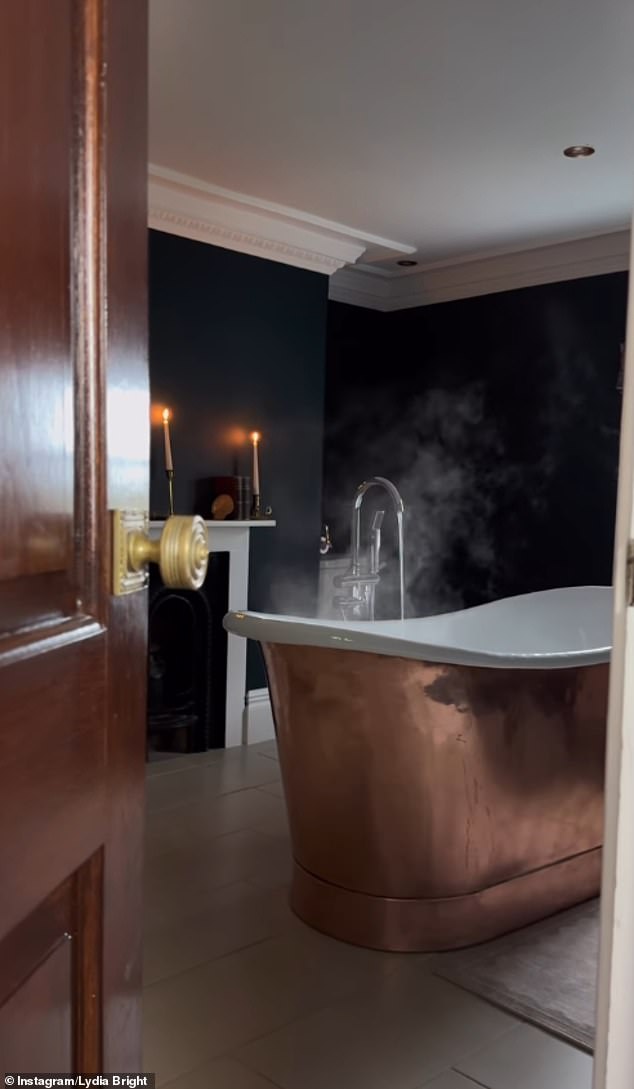 With wooden doors, a large copper bath tub and even candles, it appears that little has been spared in former Towie Star Lydia Bright's bathroom