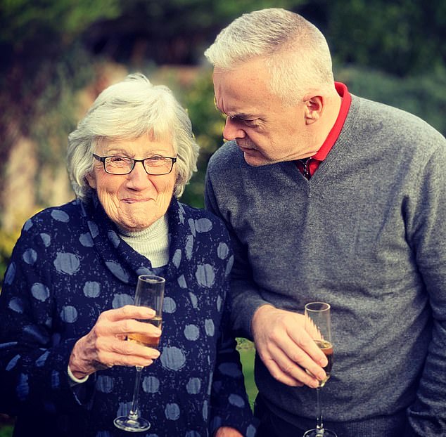 Disgraced former BBC newsreader Edwards drinking champagne with his mother Aerona Protheroe