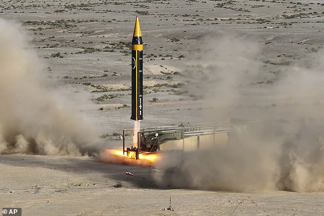 A Khorramshahr-4 missile is launched at an undisclosed location in Iran