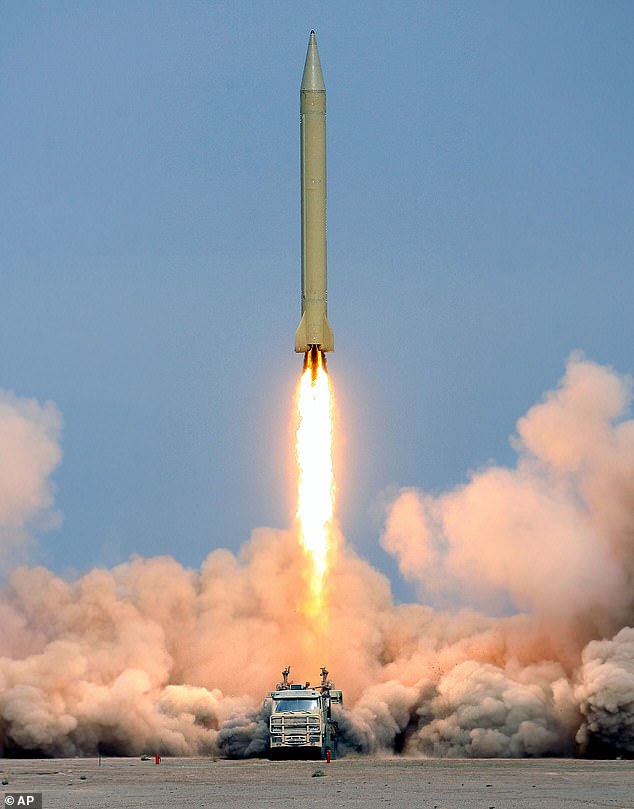 Iran's use of intermediate ballistic missiles on a British military base in the Chagos Islands has escalated fears that major European capitals are now within reach of another attack. Pictured: Long-range Shahab-3 missile being launched