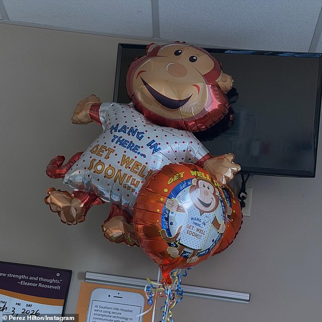 Hilton was gifted balloons that had 'Hang In There... Get Well Soon' printed on the front