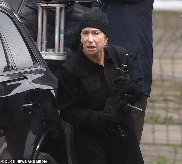 Brosnan's co-star Dame Helen Mirren looked like she meant business, clutching her firearm as the pair film scenes for MobLand series two