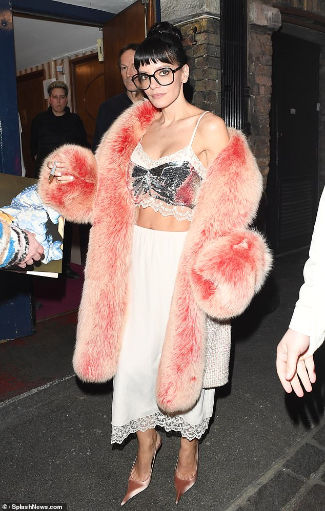 Lily wore a crop top and pink fur-trimmed jacket inspired by her on-set costume on Friday night