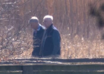 Andrew seen for first time since being released after Epstein arrest as he's spotted walking dogs at new home Marsh Farm