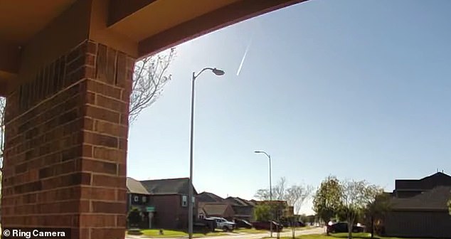 Pictured: This Ring camera footage showed the meteor as it streaked across the sky over Houston. NASA confirmed the meteor late on Saturday