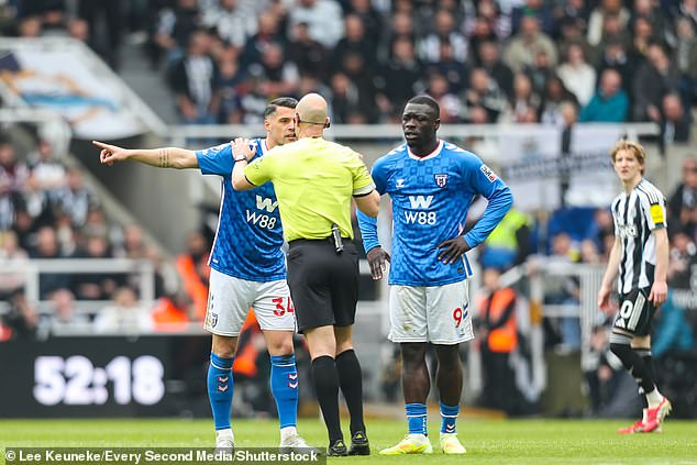 Sunderland captain Granit Xhaka (pictured with Sunderland team-mate Brian Brobbey) speaks to referee Anthony Taylor following the incident