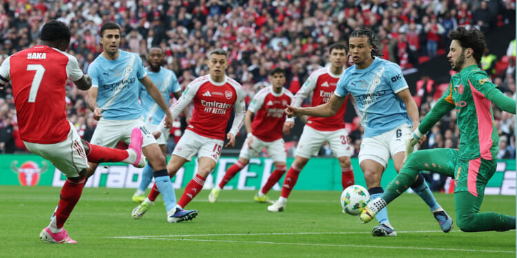 Fans stunned as Man City backup James Trafford pulls off miraculous TRIPLE save to deny Arsenal in Carabao Cup final