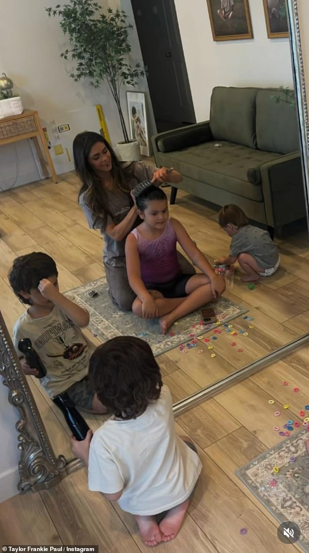 Paul also welcomed two children - daughter Indy, eight, and son Ocean, five - during her five-year marriage to ex-husband Tate Paul, which ended in 2022 following a 'soft-swinging' scandal (pictured March 6)