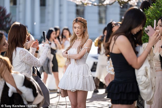 Homeowners on Lancaster Road - located just metres away from Portobello Road Market in west London - say they are constantly swamped with people taking photos in front of their properties