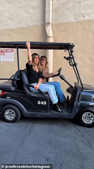 On the set of another project, she also included a photo of herself making a scared expression while Witherspoon was driving a golf cart