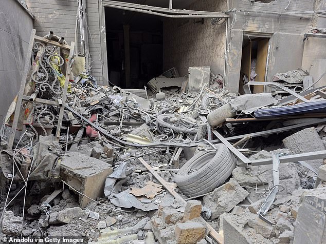 The department also warned that travel for Americans can be disrupted due to 'Periodic airspace closures' (Pictured destruction from airstrikes in Iran)