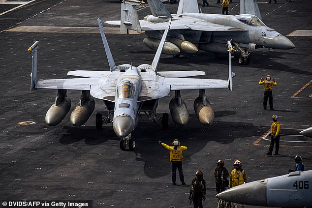 F/A-18E Super Hornet aircraft, attached to Strike Fighter Squadron 31, taxiing on the flight deck of the world's largest aircraft carrier, USS Gerald R Ford (CVN 78), on Sunday