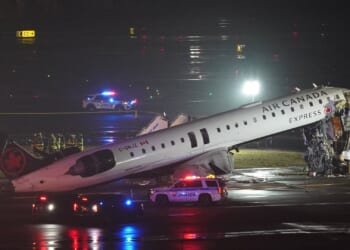 Plane crashes into fire truck on runway after landing leaving at least 4 injured as airport closes & flights suspended