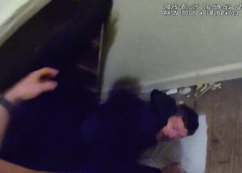 Moment cowering burglar is found hiding underneath a bed as he's arrested after breaking into home