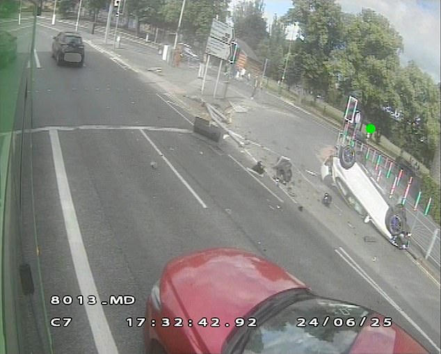 The car then flips on to its roof and hits a second set of railings at the roadside