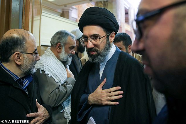 Iran's hardliners, like the new Supreme Leader (centre), hope soaring fuel prices will split America from key allies such as Japan, South Korea and the Europeans