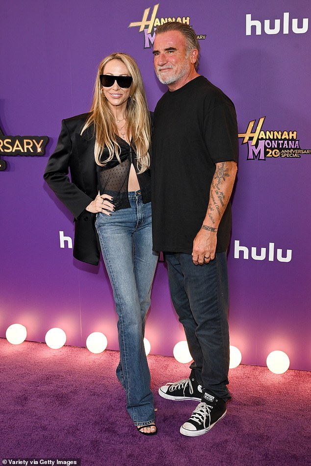 The Prison Break hunk - who reportedly 'hooked up' with Tish's daughter Noah, 26, before beginning his relationship with her mother - opted for a relaxed look, wearing a black t-shirt and jeans