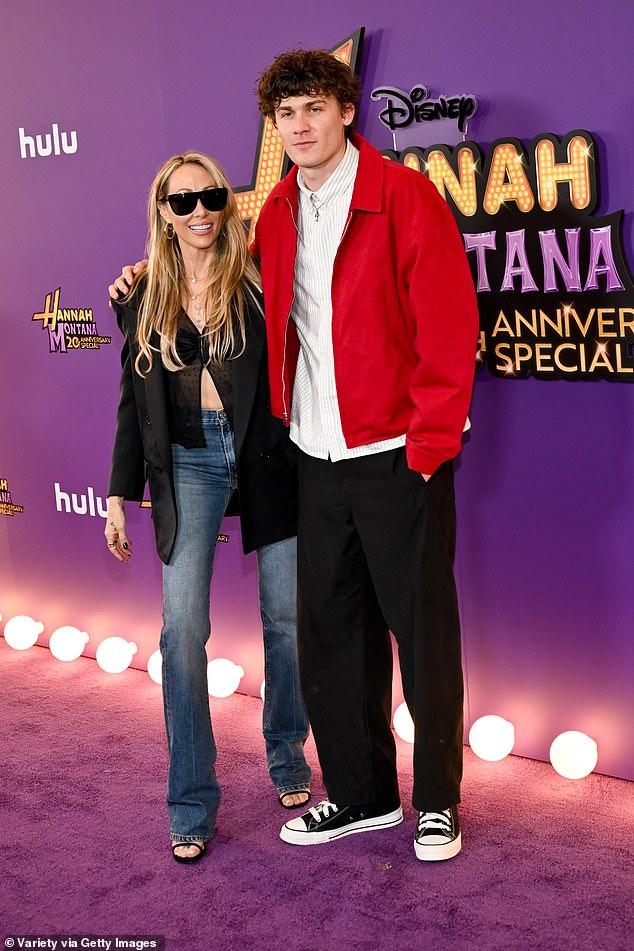 Tish also posed with Purcell's son, Joseph Purcell, 26, whom he shares with ex-wife Rebecca Williamson