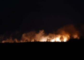 Moment roaring fire rips through moors with flames seen for miles & locals told ‘stay away’