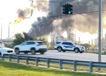 Massive explosion rocks Texas oil refinery as flames & plumes of smoke spew out of depot after locals heard 'loud boom'