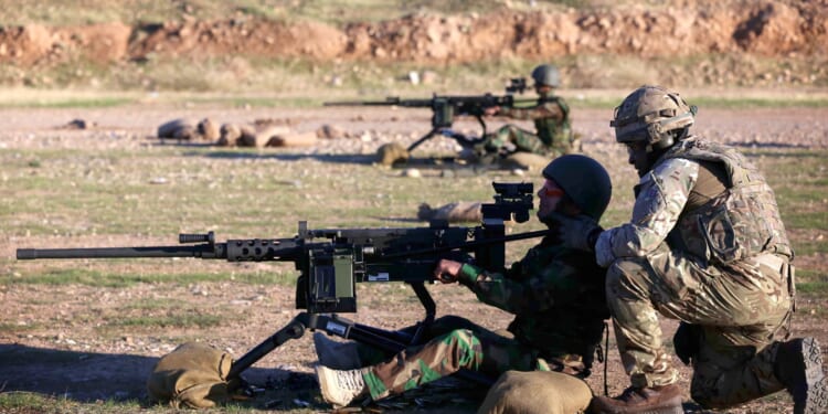 Crack British troops shoot down 14 suicide drones in ONE night in biggest Iranian blitz on UK troops since war erupted