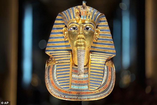 The golden burial mask of King Tutankhamun, displayed at the Grand Egyptian Museum in Giza