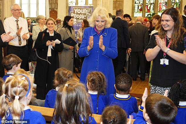Camilla chatted with school children, staff and volunteers from the town's library. As reception age children from Mount Charles Primary School in St Austell sang Twinkle, Twinkle, Little Star to her, the Queen watched on fondly and shared in their clapping