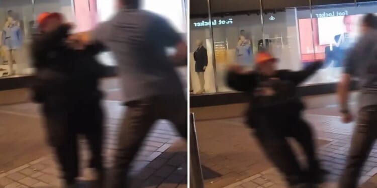 Shocking moment raging brute punches man half his size to the floor & slaps camera during heated row in city centre