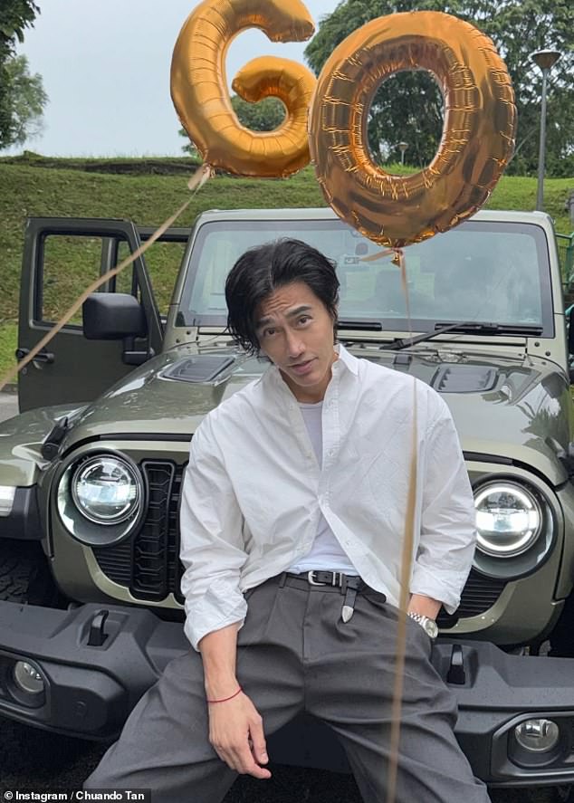 Photographer and model Chuando Tan just turned 60, but doesn't look a day over 30 with his smooth skin, full head of hair and trendy clothes