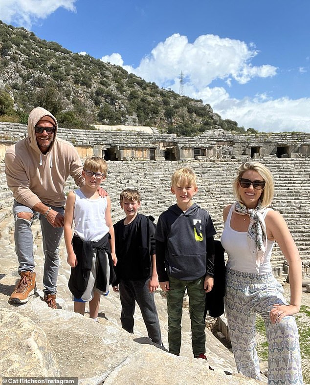 Here the family of five is seen on vacation together several years ago