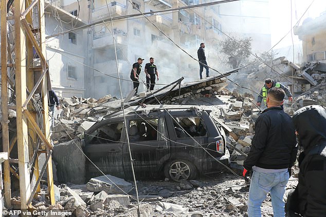 First aid responders arrive to the site of an Israeli airstrike that targeted the southern Lebanese coastal city of Tyre on March 24, 2026. Lebanon was pulled into the Middle East war when Iran-backed Hezbollah began firing rockets into Israel on March 2