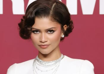 Zendaya shows off 'wedding ring' as she wears yet another white gown after 'secret wedding to Tom Holland'