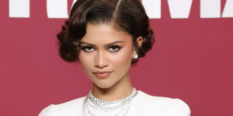 Zendaya shows off 'wedding ring' as she wears yet another white gown after 'secret wedding to Tom Holland'