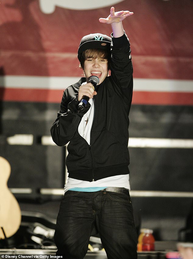 And during a past interview with People, Usher also shared that he signed Bieber after a 'bidding war' with Justin Timberlake; Bieber seen in 2009 in L.A.