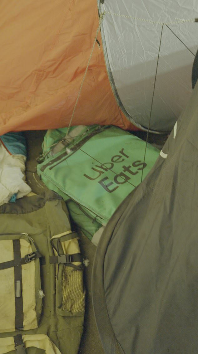 Over the course of a long shift, the sums can be pitiful. Several riders estimated they earn between £50 and £80 for a 12-hour day ¿ the equivalent of barely half the hourly minimum wage. Pictured: The London camp populated by many food delivery drivers