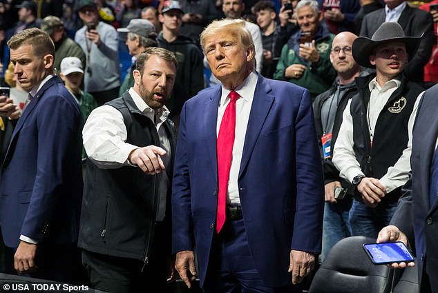 Mullin talks with Former President Donald Trump during the NCAA Division 1 Wrestling Championships at the BOK Center in 2023