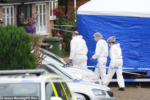 The experts also examined how Clifford meticulously planned the murder for 13 days after the break-up. Pictured: Forensic officers at the scene in Ashlyn Close, Bushey, Hertfordshire