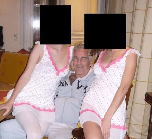 A picture from the Epstein Files of the paedophile financier with two young women in lingerie