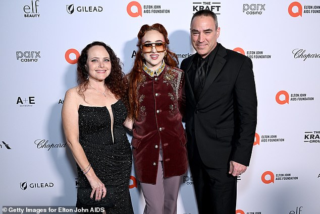 Her mum Dr Kara Amstutz earned her Doctorate in Veterinary Medicine from the University of Missouri in 2000 and founded her own practice in 2002 (pictured with her parents Kara and Dwight in March 2025)