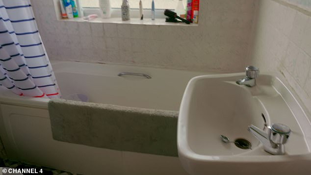 BEFORE: The pièce de resistance is a small family bathroom, which went from a dowdy tiny room into a sleek modern room with luxury marble effect tiles