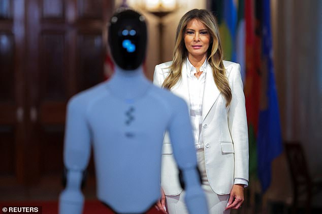 First Lady Melania Trump follows Figure 3 into the East Room of the White House on Wednesday for her Fostering the Future Together event