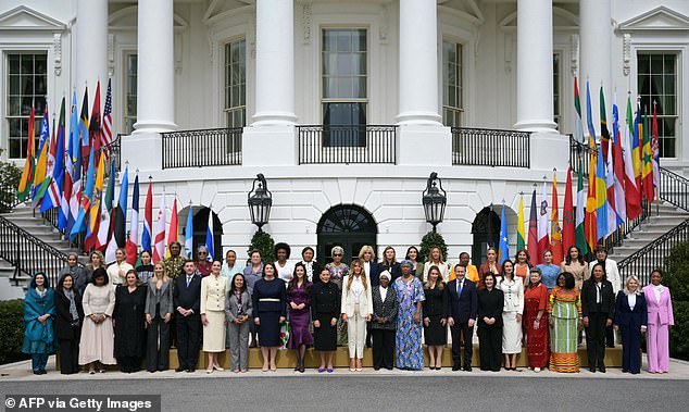 A class photo of the group of world leader's spouses and other representatives assembled by First Lady Melania Trump was taken on the South Lawn Wednesday