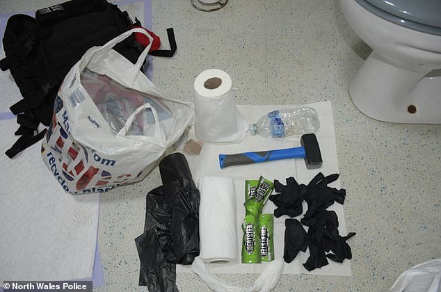 The contents of a carrier bag found by inside Roberts's home address, including a hammer
