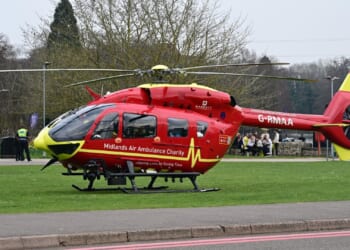 Woman rushed to hospital in air ambulance after tree smashed through car causing road closure and lengthy delays