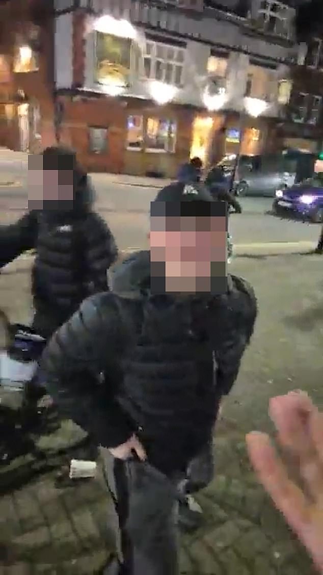 Footage captured by café owner Helen Lawson was shared to social media showing her being harassed by a gaggle of hoodlums