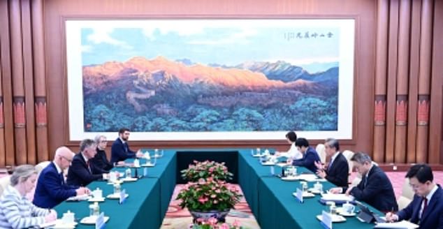 Jonathan Powell, third from left, in Beijing on Monday during secret talks which Downing Street has refused to even confirm took place