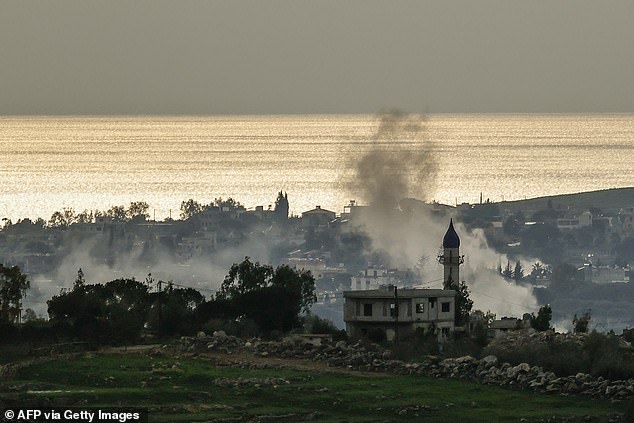 A photograph taken from the southern Lebanese area of Marjeyoun shows smoke as it rises from a site targeted by Israeli artillery in the village of Zawtar El Charkiyeh